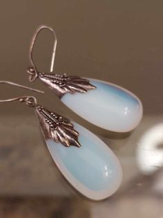 Awesome pair of Vintage Moonstone Earrings in a Silver Setting.. in nice condition... drop length is 1.25 inches. Vintage Teardrop Gemstone Earrings, Pierced Teardrop Moonstone Earrings, Moonstone Earrings, Moonstone, Jewelry Earrings Dangle, Dangle Earrings, Jewelry Earrings, Silver