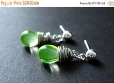 EASTER SALE Stud Earrings : Silver Wire Wrapped Mountain Dew Colored Glass Teardrop Post Earrings. Handmade Jewelry. by TheTeardropShop from The Teardrop Shop. Find it now at https://ift.tt/1LSH8OI! Peridot Green, Handcrafted Artisan Jewelry, Wire Wrapped Earrings, Silver Stud Earrings, Matching Necklaces, Earring Backs