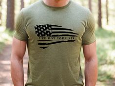 This classic unisex jersey short sleeve tee celebrates Military, Police, Patriots, Old Veterans or anyway saying I got your back.  It fits like a well-loved favorite. Soft cotton and quality print make users fall in love with it over and over again. These t-shirts have-ribbed knit collars to bolster shaping. The shoulders are tapered for a better fit over time. Dual side seams hold the garment's shape for longer. If your in the military or any kind of law enforcement Men or Women give this as a gift to you or someone else.  * Unisex t shirt fits like a well-loved favorite, featuring a crew neck, short sleeves and designed with superior airlume combed and ring-spun cotton that acts as the best blank canvas for printing. * Features: Side-seamed. Retail fit. Unisex sizing. Shoulder taping : F Custom Print Short Sleeve Tops For Independence Day, Independence Day Custom Print Short Sleeve Tops, Short Sleeve Tops With Custom Print For Independence Day, Independence Day Short Sleeve Tops With Custom Print, Made In Usa Crew Neck T-shirt For Veterans Day, Memorial Day Crew Neck T-shirt With Text Print, Memorial Day Text Print Crew Neck T-shirt, Memorial Day Cotton Crew Neck T-shirt, Veterans Day Crew Neck T-shirt Made In Usa