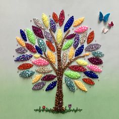 there is a colorful tree made out of beads