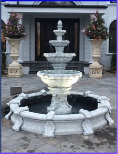 a water fountain in front of a building