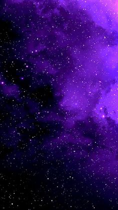 the night sky is filled with stars and purple hues, as well as dark clouds