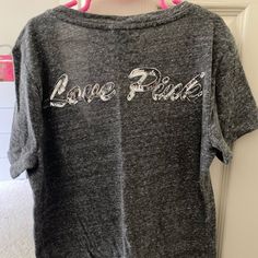 Vs Pink Bling Tee In Excellent Condition ! It Is Barely Worn, Perfect To Pair W Shorts Or Jeans! Can Be Worn In Any Weather And Is Very Comfortable As Well. Feel Free To Leave An Offer! Casual Silver T-shirt With Letter Print, Silver Casual T-shirt With Letter Print, Casual Crew Neck Tops With Glitter Print, Casual Silver Crew Neck Top, Casual Silver Top With Graphic Print, Casual Silver Tops With Graphic Print, Trendy Silver Short Sleeve Top, Trendy Silver Crew Neck Tops, Silver Crew Neck T-shirt With Letter Print