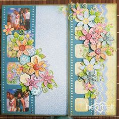 an open scrapbook with flowers and pictures on it, next to a blue ribbon