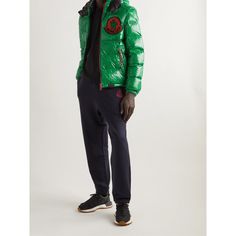 The designs in Moncler Genius' '2 Moncler 1952' collection are inspired by the brand's founding year. This 'Haggi' jacket is made from green recycled shell with a high-shine finish and insulating down filling. It's accented with contrasting red trims, a logo patch and a drawstring hood and hem. Designer Winter Outerwear With Logo, Designer Winter Outerwear With Logo Detail, Winter Hooded Outerwear With Logo Detail, Hooded Winter Outerwear With Logo Detail, Moncler Genius, Jacket For Men, Mr Porter, Down Jacket, Patch Logo