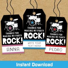 three tags with the words rock on them and an image of a drum set next to it