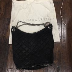 Re-Posh: Black With Quilted Design And Chain Handle, Authentic, In Great Condition, No Tears Or Stains On Outside. I Love This Bag, Just Don’t Carry It Anymore. Designer Hobo Bag With Leather Handles For Evening, Designer Shopping Bag With Chain Strap, Designer Bags With Chain Strap For Shopping, Designer Everyday Bags With Chain Strap, Designer Bags With Chain Strap For Everyday Use, Designer Tote Shoulder Bag With Chain Strap, Designer Leather Bags With Chain Strap, Stella Mccartney Falabella, Just Don