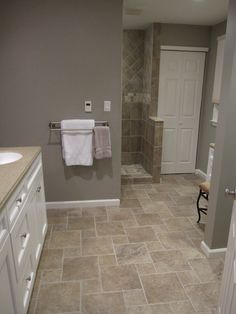 the bathroom is clean and ready to be used as a guest room or family room