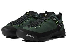 SALEWA Wildfire Leather - Men's Shoes : Raw Green/Black : Get ready for memorable trails on your holidays, wearing SALEWA Wildfire Leather footwear. Suede leather upper. Textile lining. Removable Ortholite footbed. POMOCA S Path technology. 3F system. Rubber toe cup. Climbing lacing system. Heel pull-tab. Stretch gaiter. Reinforced rand. Synthetic lug outsole. Imported. Measurements: Weight: 13 oz Product measurements were taken using size 9.5, width M. Please note that measurements may vary by Salewa Shoes Men, Low-top Leather Trail Running Shoes For Walking, Leather Low-top Trail Running Shoes For Walking, Leather Trail Running Shoes For Hiking With Round Toe, Black Leather Trail Running Shoes With Rubber Sole, Green Leather Trail Running Sneakers, Black Leather Trail Running Shoes, Leather Low-top Hiking Boots For Trail Running, Black Leather Trail Running Shoes For Outdoor Activities