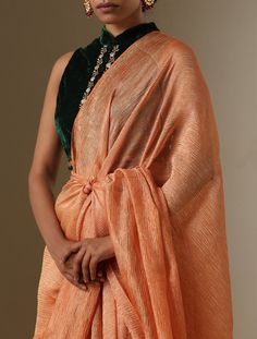 Embrace effortless sophistication with our Crush Tissue Sarees. Crafted to captivate, these sarees feature a delicately crinkled texture that exudes timeless elegance. Designed for graceful draping and enduring style, they effortlessly blend tradition with contemporary allure. Elevate your look with the enchanting charm of our Crush Tissue Sarees, a perfect fusion of artistry and grace Luxury Orange Banarasi Silk Pre-draped Saree, Tissue Sarees, Tissue Silk Saree, Tissue Saree, Minimal Look, Elegant Drapes, Silk Saree, Festival Season, Custom Color