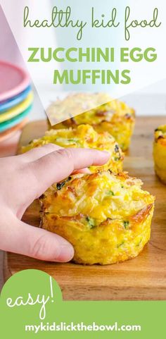 a person is picking up an egg muffin from a cutting board with the words healthy kid food zucchini egg muffins