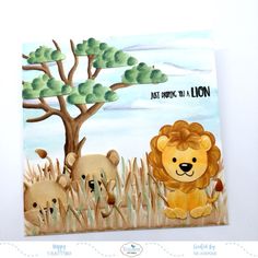 a card with an image of a lion and two cubs