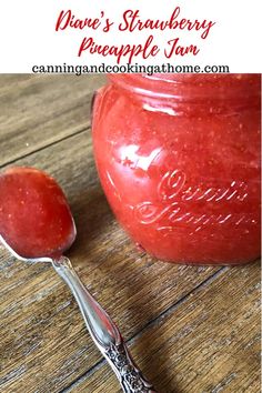 there is a spoon that is next to a jar with some fruit on it and the words, dance's strawberry preapple jam