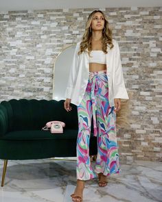 Riviera Print_model1 Des:Model is 5’9” and wears size S and US 4 Wrap Pant, Jumpsuit Design, Unique Styling, Wrap Pants, Designer Jumpsuits, Closet Staples, Pleated Fabric, The Restaurant, Monaco