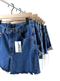 "Custom Made Authentic Vintage Levi's High Waisted Shorts *This listing is for indigo blue denim wash only. Light to medium denim wash is also available in the denim category on the shop's home page. *Shop size 00-6 here: https://www.etsy.com/listing/1007699818/custom-made-vintage-levi-high-waisted?ref=as_recently_viewed-2&frs=1 CUSTOMIZE: *The shorts come in 6 different Style/Cut combinations as pictured: -Plain Jane, Cuff Cut -Plain Jane, Straight Cut -Distressed, Cuff Cut -Distressed, Str Dark Wash Denim Cutoff Bottoms, Indigo High Rise Bottoms For Summer, Indigo High Rise Jeans For Summer, Indigo High Rise Summer Jeans, Summer High Rise Indigo Jeans, Dark Wash Recycled Denim Cutoff Bottoms, Cutoff Recycled Denim Bottoms With Pockets, High Rise Recycled Denim Bottoms With Frayed Hem, Dark Wash Rigid Denim Cutoff Jeans