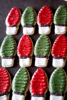 decorated cookies in the shape of christmas lights