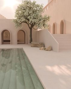 a tree in the middle of a pool surrounded by white walls and arches with stairs leading up to it