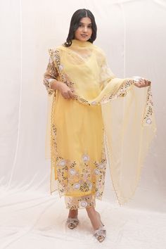 Yellow sheer kurta with thread embroidered floral motifs, pearl embellishments and scalloped borders. Comes with culottes, undershirt and dupatta. - Aza Fashions Yellow Organza Sharara With Dabka Work, Yellow Organza Kurta With Dabka Work, Yellow Elegant Georgette Churidar, Elegant Yellow Georgette Churidar, Spring Yellow Anarkali Set For Wedding, Spring Wedding Yellow Anarkali Set, Yellow Organza Kurta With Zari Work, Yellow Semi-stitched Organza Salwar Kameez, Yellow Organza Salwar Kameez For Festive Occasions