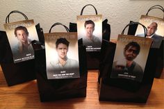 several bags with pictures of people on them