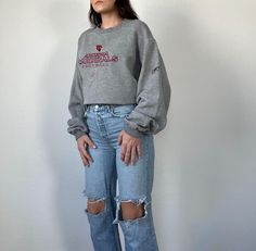 Cool and trendy vintage embroidered Arizona Cardinals sweatshirt from the 90s - comfy, too! In good vintage condition. Unisex item. Measurements taken while item is laid flat. Measurements: bust: 25" length: 27" Tag size: No tag size Fabric: No fabric information Model is 5'6 with a waist 26" and hips 36" FOLLOW US ON INSTAGRAM @theweathereddaisy FOR RELEASE DATES + STORY SALES! SHOP OUR WEBSITE theweathereddaisy.com FOR EVEN MORE EXCLUSIVE APPAREL. Vintage College Sweatshirt With Embroidered Text, Vintage Embroidered Sweatshirt For Streetwear, 90s Embroidered Long Sleeve Sweatshirt, Vintage Sweatshirt With Embroidered Text For Streetwear, 90s Embroidered Sweatshirt For Fall, 90s Embroidered Fall Sweatshirt, Vintage Embroidered Long Sleeve Sweatshirt, Vintage Long-sleeved Embroidered Sweatshirt, Vintage Winter Sweatshirt With Embroidered Text