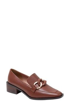 A two-tone chain graces the apron toe of this rich leather loafer lofted on a chunky block heel with a slip-resistant rubber sole. 1 1/2" heel Cushioned footbed Leather upper/synthetic lining/rubber sole Imported Brown Block Heel Loafers For Work, Brown Platform Loafers With Block Heel For Formal Occasions, Formal Brown Platform Loafers With Block Heel, Brown Loafers With Metal Feet For Work, Brown Block Heel Platform Loafers For Work, Brown Platform Loafers With Block Heel For Work, Chic Brown Block Heel Loafers, Chic Brown Platform Loafers For Work, Elegant Brown Platform Loafers For Work