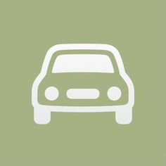 a white car icon on a green background