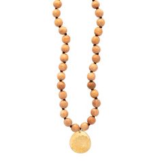 Blonde Wood Long Beaded Necklace Charm Gold - MAS Designs Wooden Beads Amulet Jewelry For Meditation, Meditation Amulet With Wooden Beads, Natural Wooden Beads Necklace For Meditation, Natural Wood Jewelry With Round Wooden Beads, Wooden Beads Jewelry For Meditation, Natural Wooden Beads Spiritual Jewelry, Artisan Necklace With Wooden Beads For Meditation, Gold Gemstone Beads Necklace, Earthy Wooden Beads Jewelry For Meditation