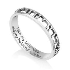 Fine quality sterling silver ring with carved out Hebrew Scripture quote and inside the ring, the verse engraved in English. Scripture in openwork cutout design925 sterling silver Wedding ring, promise ringInside the ring, the words are translated to English in clean lettering designHebrew: Ani Ledodi Vedodi Li English:I am my beloved's, and my beloved is mine from Song of Solomon 6:3Available in a variety of sizesCreated by Marina, designer and artist from the Holy LandWhite gift box Marina bri Unity Ring, Sterling Silver Wedding Rings, Carved Ring, Jewish Jewelry, Ring Ideas, Silver Wedding Rings, Christian Jewelry, Lovely Jewellery, Jewelry Silver