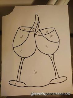 a drawing of two wine glasses with numbers on them