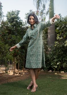 Green Midi Dress Floral Printed and Embroidery Work Design Long Sleeve Midi Cotton Button Down Dress with Collar Women Summer Short Dress Fabric - Cotton  Sleeve - Full Sleeves Work - Printed and Embroidery Color - Green Size - (XS), (S), (M), (L), (XL), (2XL) Length of the Dress- 45" (114 cm) This is a lovely green midi dress for women, perfect for summer. It has a floral print and embroidery work design, adding a touch of elegance. The dress features long sleeves and a button-down front with a Embroidery Work Design, Summer Dresses Knee Length, Midi Dress Floral, Dress With Collar, Short Summer Dresses, Cotton Dress Summer, Work Design, Green Midi Dress, Button Down Dress