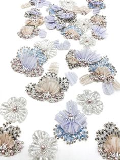 many different types of brooches and bows