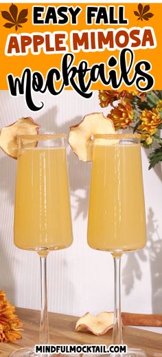 two glasses filled with apple mimosa cocktails on top of a wooden table