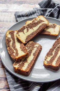 slices of chocolate and white marble swirl bread on a gray plate with black napkins