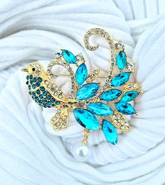 Luxurious elegant fun vibrant clothes pin exquisite vibrant blue bird brooch  Unique intricate attributes with remarkable crystal rhinestone detailing Vibrant Clothes, Lucky Jewelry, Pearl Design, Bird Brooch, Jewelry Pins, Vibrant Blue, Crystal Pearls, Exquisite Jewelry, Clothes Pins