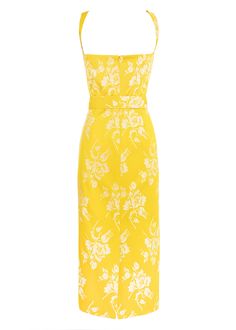 a yellow dress with white flowers on the front and back, is shown in this image