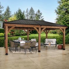 a covered patio area with chairs and tables