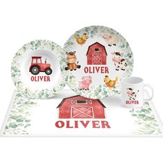 a set of dishes with farm animals on them and the words oliver written in red