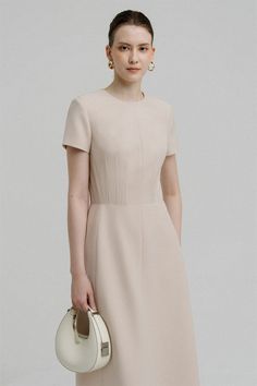 This dress features an A-line cut and a classic round neck, providing a flattering fit for any body type. Made with a high quality blend of polycotton, this midi dress is both comfortable and stylish, making it a versatile addition to any wardrobe. Beige Non-stretch Midi Dress, Beige V-neck Midi Dress With Pockets, Beige Midi-length Cotton Dress, Elegant Beige A-line Shirt Dress, Beige A-line Midi Dress With Button Closure, A Line Cut, Mean Blvd, Beige Light, Special Features