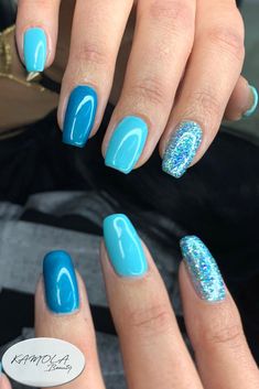 blue gel polish with blue glitter on natural nails Blue Nails Sparkle Glitter, Beach Vacay Nails Blue, Lake Blue Nails, Simple Blue Gel Nails, Blue Gel Nails With Glitter, Blue Glitter Gel Nails, Blue Nail Polish Ideas, Blue Gel Nails Ideas, Blue And Silver Nail Designs