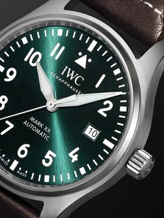 IWC SCHAFFHAUSEN's watch is a refined, minimal take on the legendary 'Mark 11' reference, designed in 1948 to meet the needs of British Royal Air Force navigators and pilots. Brought to life by a calibre 32111 automatic movement with an impressive 120-hour power reserve, this model has a high-contrast green dial illuminated by easy-to-read markings and a robust, corrosion-resistant stainless steel case. The anti-reflective sapphire glass crystal is specially secured, so it remains in place thro… Timeless Green Watch With Date Display, Green Timeless Watch Accessories With Date Display, Timeless Green Watch Accessories With Date Display, Luxury Watch With Date Display, Classic Green Watch With Date Indicator, Luxury Green Watch Accessories With Date Display, Timeless Green Watch With Diamond Hour Markers, Classic Green Chronometer Watch, Luxury Green Watches With Polished Finish