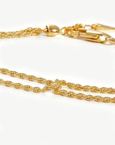 Double Rope Bracelet. A Versatile Everyday Chain. Featuring a Double Rope Design, this Distinctive Bracelet Fastens with a Claw Clasp. Wear as a Standout Solo Piece, or Stack with a Bold Cuff for the Ultimate Arm Stack. Metal: 18Ct Gold Plated Vermeil on Sterling Silver Dimensions: Total Length: 180 mm Chain: Extensions Starting from 165mm Continuous to 180mm Weight: 2. 4 g Product Code: Yn-G-B2-Dl-R Arm Stack, Jewellery Advent Calendar, Gold And Silver Bracelets, Mixed Metal Jewelry, Diamond Gift, Festival Jewelry, Rope Design, Diamond Hoop Earrings, Gemstone Bracelets