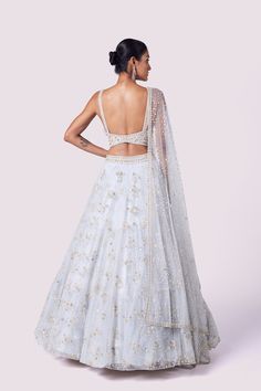 Alluring powder blue embroidered net designer lehenga is perfect for wedding and wedding festivities. Shop online from Pure Elegance. Disclaimer: The actual product may vary slightly from the image. These are custom orders, hence expect slight variation in color and placement of the motif or buta. ESTIMATED DELIVERYBecause this is a custom order, it would take about 4 weeks from the date of purchase. RETURN POLICYThis product is a custom order and cannot be returned or exchanged. Sharara Suits, Wedding Festivities, Lehenga Online, Pure Elegance, Fashion Journals, Designer Lehenga, Traditional Fabric, Anarkali Suit, Designer Sarees