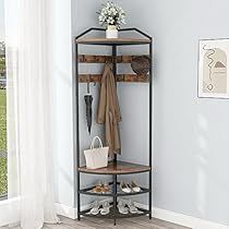 a corner shelf with shoes and purses on it in front of a wall mounted coat rack