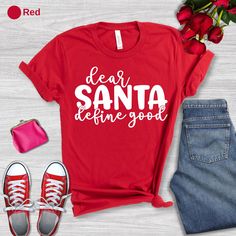 Dear Santa Define Good Shirt, Funny Christmas T-shirt, Define Good Shirt, Xmas Party Tee, Santa Shirt, Cute Christmas Gift, Holiday Gift Tee Thank you for choosing our products! We're delighted to deliver your order promptly. Below, you'll find essential details about Product Specifications, Care Instructions, and the Shipping Process: Product Specifications: *Material: Our T-shirts and onesies are made from 100% Airlume combed and ring-spun cotton, offering a blend of comfort and durability. *F Red Short Sleeve Holiday Top, Red Short Sleeve Top For Holidays, Red Letter Print T-shirt For Gift, Red Letter Print T-shirt As Gift, Red T-shirt With Letter Print As Gift, Festive Christmas Crew Neck T-shirt, Christmas Crew Neck T-shirt With Letter Print, Festive Crew Neck T-shirt For New Year, Christmas Holiday T-shirt With Letter Print