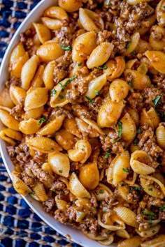 easy one pot cheesy taco pasta in a bowl with the title above it