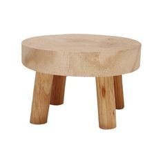 a small wooden stool sitting on top of a white background