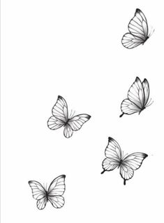 four butterflies flying in the air with one on its back and one on its side