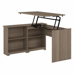 an office desk with a book shelf underneath it