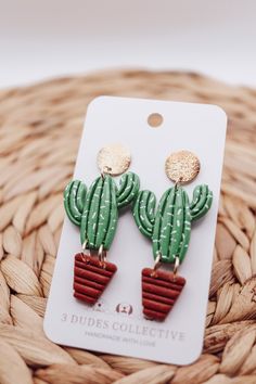 the cactus earrings are green and red