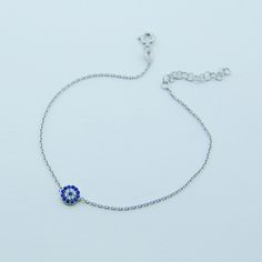 Sterling Silver Evil Eye Bracelet, designed with evileye charm, Evil eye Bracelet. A nice bracelet could be used as a bridesmaid gift. 925 Sterling Silver with Real Sapphire and CZ stones(Evil Eye Jewelry) if you need longer chain can be upon request ,please send me a convo, All my jewelery is hand crafted with pure and 925 sterling silver , this is a safe way for you to store bracelet will be sent along with a beautiful gift box and pouch Silver Chain Bracelet With Evil Eye Detail, Sterling Silver Evil Eye Bracelet, Beautiful Anklet, Gold Plated Bracelets, Eye Protection, Evil Eye Bracelet, Photo Bracelet, Evil Eye Jewelry, Cz Stone